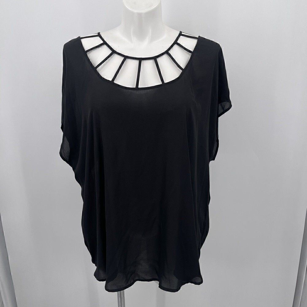 Torrid womans top size 3xL black short sleeve unique cut out neckline BoxK